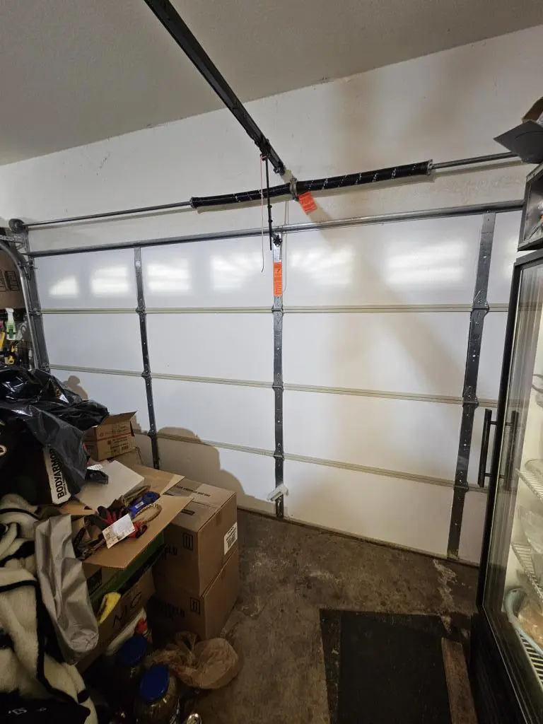 Garage Door Repair in Plano technician arriving in service truck for residential repair in a suburban neighborhood