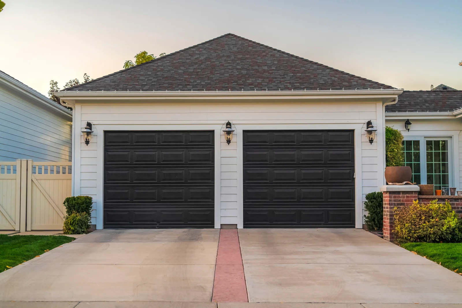 Garage Door Repair in Lucas service installing a modern insulated garage door in a Lucas TX home near Fairview border