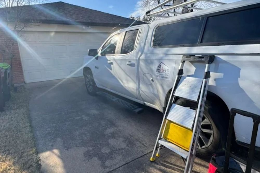 Apex Garage Pro service truck at a residential garage door job
